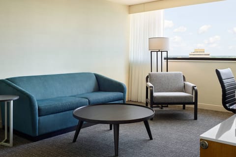 Desk, laptop workspace, blackout drapes, iron/ironing board