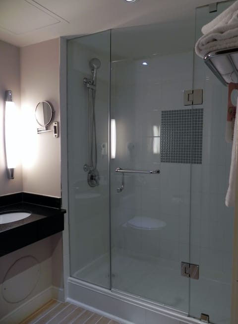 Shower, eco-friendly toiletries, hair dryer, towels