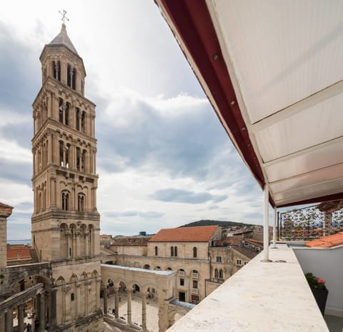 Double Room, Balcony, City View | Free minibar, in-room safe, desk, blackout drapes