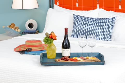 Desk, laptop workspace, iron/ironing board, free cribs/infant beds