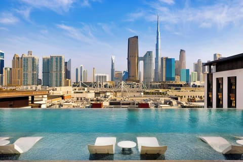 Outdoor pool, open 7:00 AM to 6:00 PM, sun loungers
