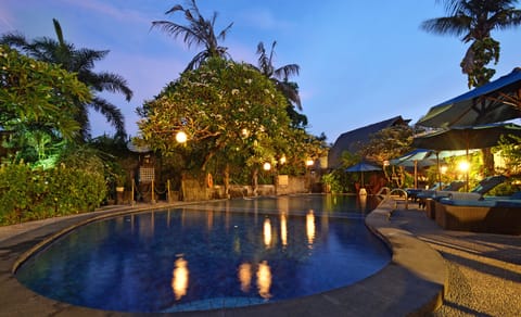 Outdoor pool, open 7 AM to 6:00 PM, pool umbrellas, sun loungers