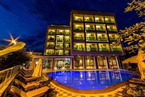 Outdoor pool, pool umbrellas, sun loungers