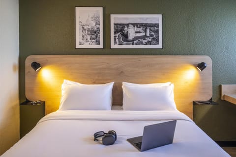 Premium bedding, desk, blackout drapes, iron/ironing board