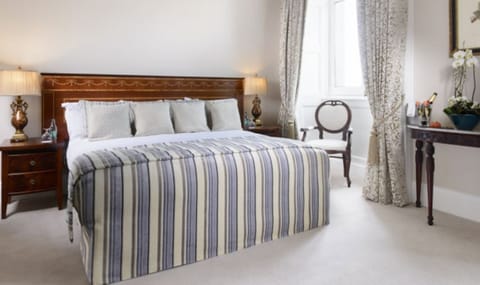 Deluxe Room | Desk, iron/ironing board, free WiFi, bed sheets