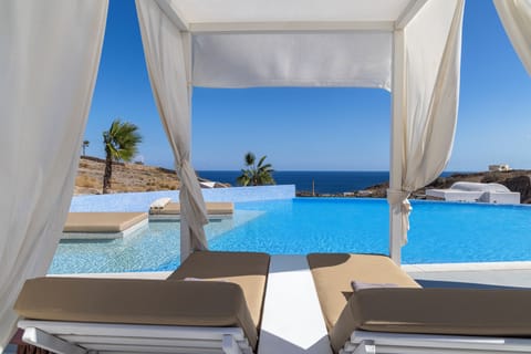Outdoor pool, free cabanas, pool umbrellas