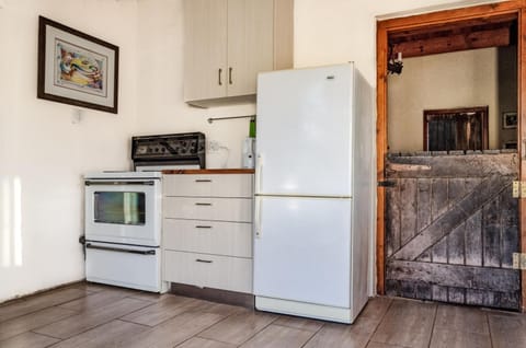 Fridge, stovetop, coffee/tea maker, cookware/dishes/utensils