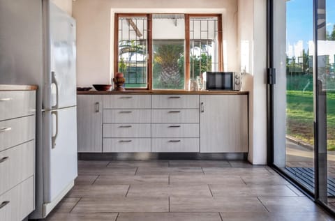 Fridge, stovetop, coffee/tea maker, cookware/dishes/utensils