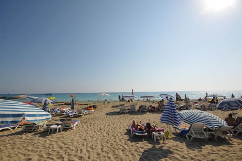 Private beach nearby, sun loungers, beach umbrellas