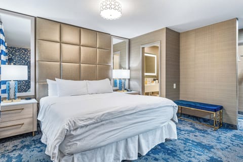 Premium bedding, down comforters, desk, laptop workspace