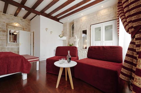 Superior Double Room, City View | Living area | Flat-screen TV