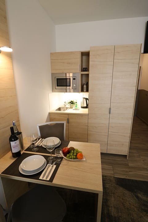 Mini-fridge, microwave, coffee/tea maker, electric kettle