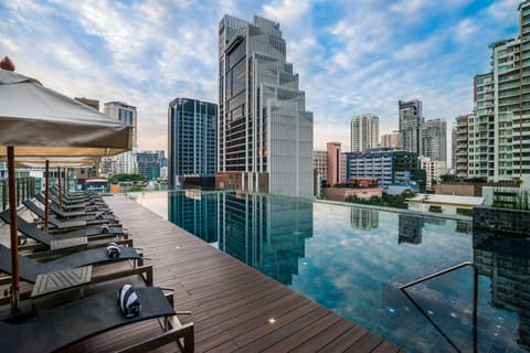 Outdoor pool, pool umbrellas, sun loungers