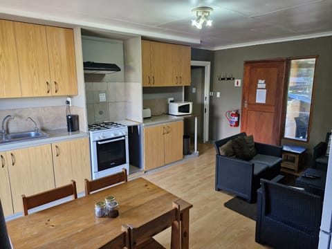 Family Cottage, 2 Bedrooms (Self Catering cottage for 4) | Private kitchenette | Mini-fridge, microwave, cookware/dishes/utensils, freezer
