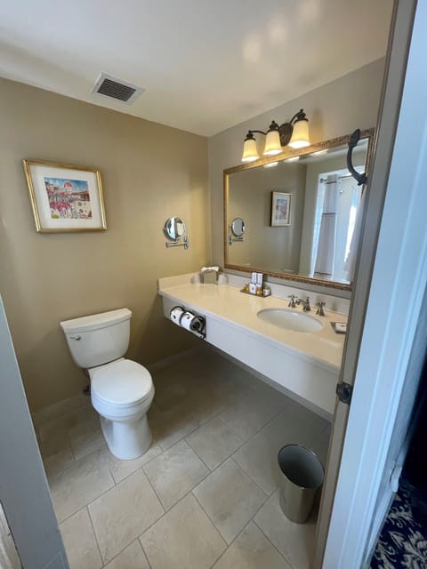 Combined shower/tub, designer toiletries, hair dryer, bathrobes