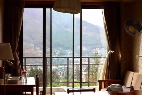 Standard Suite | Living area | Flat-screen TV