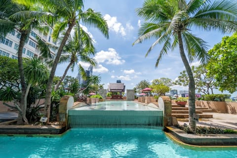 Outdoor pool, open 7:00 AM to 9:00 PM, pool umbrellas, sun loungers