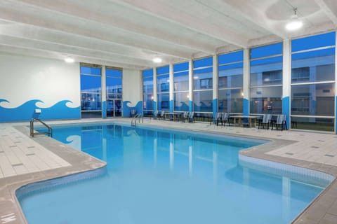 Indoor pool, open 9:00 AM to 10:00 PM, sun loungers