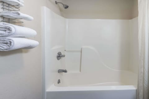 Studio Suite, 1 King Bed, Non Smoking | Bathroom | Free toiletries, hair dryer, towels