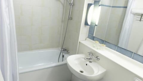 Combined shower/tub, eco-friendly toiletries, hair dryer, towels