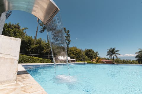 Outdoor pool, pool umbrellas, sun loungers