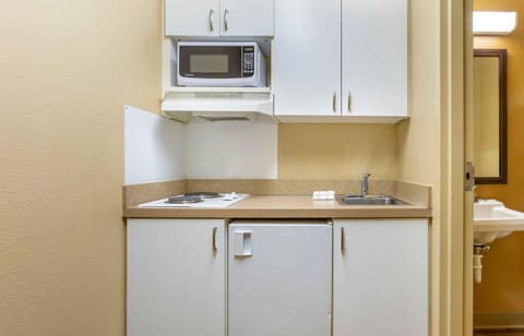 Fridge, microwave, stovetop, cookware/dishes/utensils