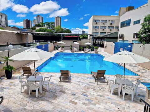 Outdoor pool, pool umbrellas, sun loungers