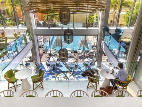 Breakfast, lunch, dinner served; Mediterranean cuisine, pool views 
