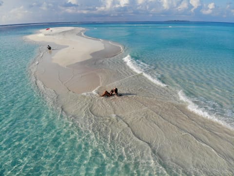 Private beach, white sand, snorkeling, water skiing