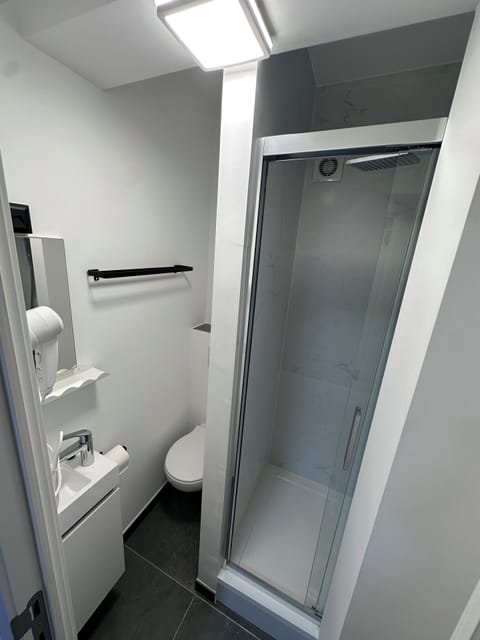 Shower, free toiletries, hair dryer, towels