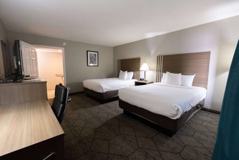 Desk, laptop workspace, blackout drapes, iron/ironing board