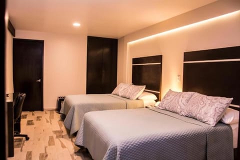 Comfort Quadruple Room, 2 Double Beds | In-room safe, desk, iron/ironing board, free WiFi