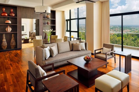 Executive Suite, 1 Bedroom | Living area | 32-inch LCD TV with cable channels, TV