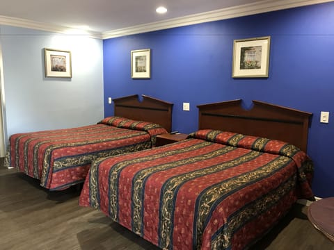 Standard Single Room, 2 Queen Beds, Courtyard View | 1 bedroom, desk, laptop workspace, free WiFi