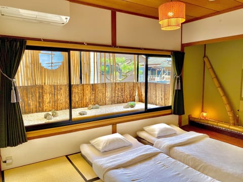 Japanese Style Room, 3 People (Shared bathroom and toilet) Check-in 5PM to 9PM | Desk, blackout drapes, free WiFi, bed sheets