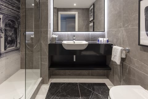 Combined shower/tub, hair dryer, towels, soap