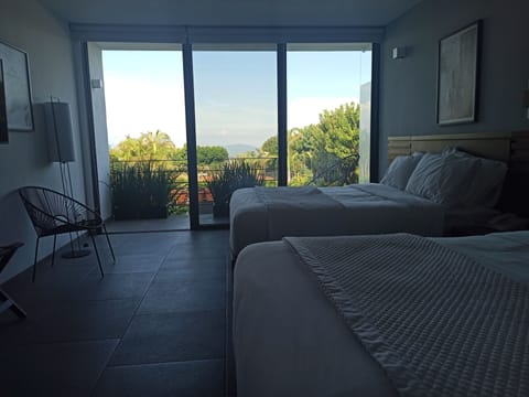 Deluxe Room | In-room safe, desk, iron/ironing board