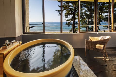 Ocean View Japanese Western Twin Room with Semi-Open-Air Bath, Non Smoking | Bathroom | Separate tub and shower, free toiletries, electronic bidet, towels