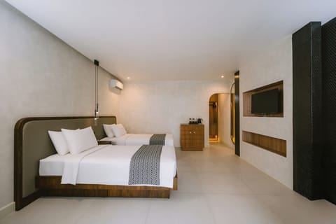 Deluxe Plus Twin Room | Minibar, in-room safe, desk, iron/ironing board