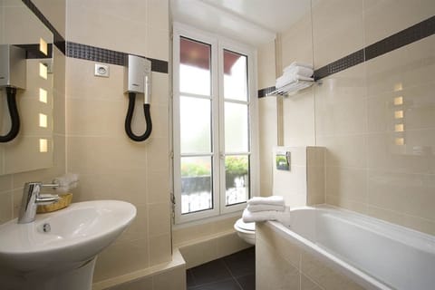 Combined shower/tub, hair dryer, towels, soap