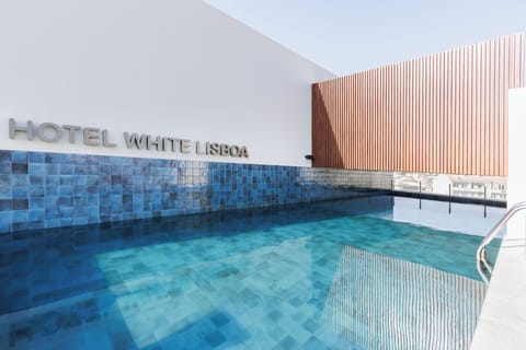 Seasonal outdoor pool, open 8:00 AM to 8:00 PM, sun loungers