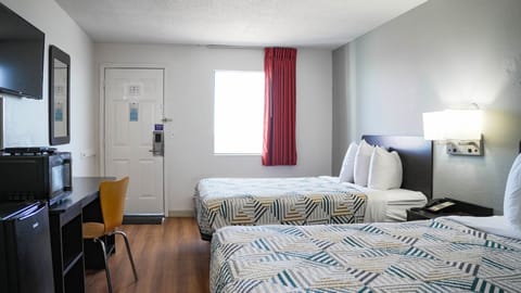 Deluxe Room, 2 Queen Beds, Non Smoking, Refrigerator & Microwave | WiFi (free), bed sheets
