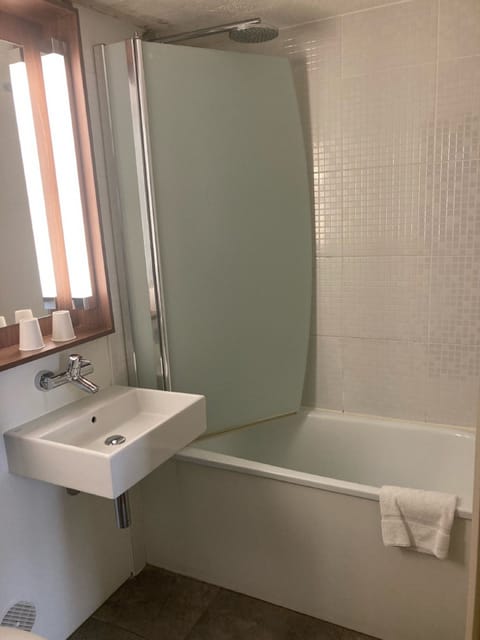 Eco-friendly toiletries, hair dryer, towels