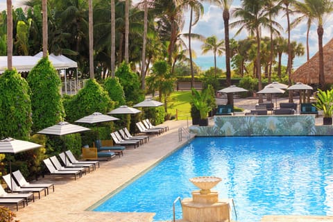 Outdoor pool, open 8:00 AM to 7:00 PM, cabanas (surcharge)