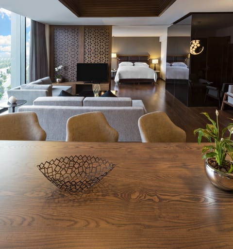 Premium bedding, down comforters, pillowtop beds, minibar