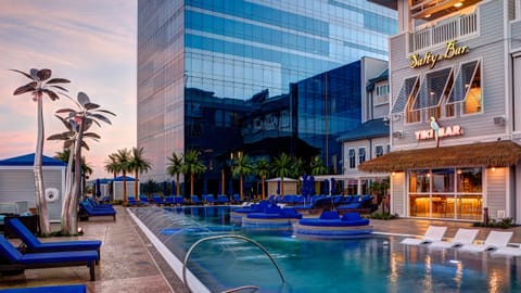 Seasonal outdoor pool, open 1:00 PM to 10:00 PM, cabanas (surcharge)
