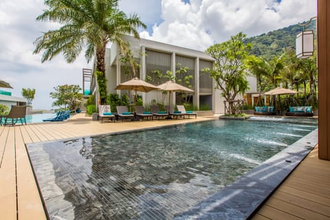 Outdoor pool, open 7:00 AM to 7:00 PM, pool umbrellas, sun loungers