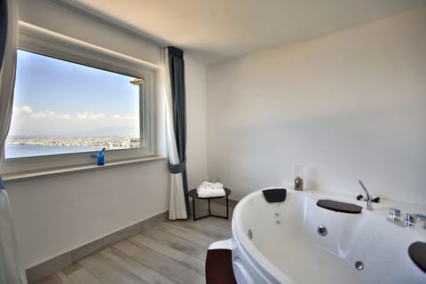 Junior Suite, Sea View | Jetted tub