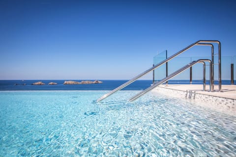 Indoor pool, 2 outdoor pools, pool umbrellas, sun loungers