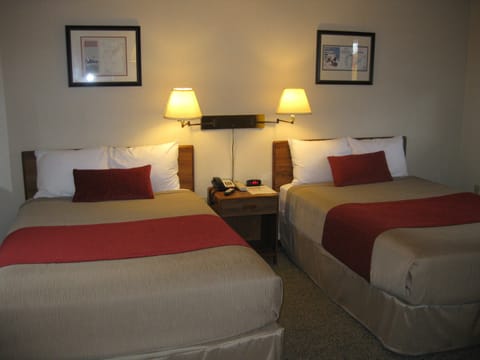 Premium bedding, blackout drapes, iron/ironing board